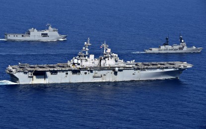 <p><strong>'BALIKATAN 2019'. </strong>The amphibious assault ship USS Wasp (LHD 1) (center), maneuvers alongside the Philippine navy landing platform dock ship BRP Tarlac (LD 601) and offshore patrol vessel BRP Ramon Alcaraz (PS 16) in support of Exercise Balikatan 2019 in the South China Sea on April 5, 2019. In its 35th iteration, Balikatan is an annual US-Philippine military training exercise focused on a variety of missions, including humanitarian assistance and disaster relief, counter-terrorism, and other combined military operations. (US Navy photo by Mass Communication Specialist 1st Class Daniel Barker)</p>