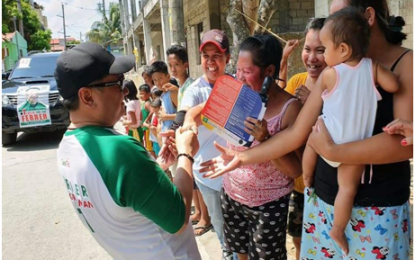 <p>Unopposed bets in Cavite, like 6th District Rep. reelectionist Luis Ferrer IV, still embark on his campaign to touch base with constituents during a sortie in Barangay Bacao 1, General Trias City, Cavite on April 11, 2019. <em>(PNA photo by Dennis Abrina)</em></p>