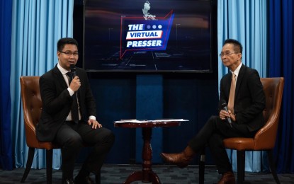 <p><strong>PILOT EPISODE</strong>. JV Arcena (left) introduces Presidential Spokesperson Salvador Panelo during the pilot episode of "The Virtual Presser" on Monday (April 15, 2019). The Virtual Presser is the first-ever online video platform of the Presidential Communications Operations Office, in partnership with RTVM. <em>(Photo courtesy of PCOO OGMA)</em></p>