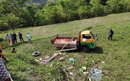 <p><strong>DEADLY RIDE</strong>. A dump truck falls into a five-meter ravine at Barangay Balaway on Saturday morning (April 20, 2019),killing seven people and injuring 15 others. The victims were on their way to visit a sick elder when the accident happened. <em>(Photo courtesy of Kalinga PPO)</em></p>