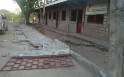 <p><strong>STRONG TREMOR</strong>. Camias High School's perimeter fence in Pampanga collapses due to the 6.1 magntitude earthquake on Monday. <em>(Photo courtesy of Raul Sarmiento)</em></p>