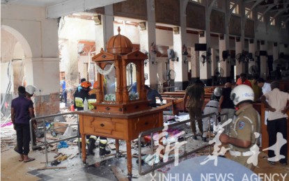 <p>People work at a blast scene at St. Anthony's Church in Kochchikade in Colombo, Sri Lanka on April 21, 2019 <em>(Xinhua photo)</em></p>