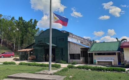 <p><strong>MOURNING. </strong> Philippine flag inside the base camp of Philippine Army 46<sup>th</sup> Infantry Battalion in Calbiga, Samar at half-mast after a fire fight with communist rebels that killed six soldiers and wounded six others early Tuesday (April 23, 2019). Soldiers are in pursuit of the rebels involved in a fierce gun battle. <em>(Photo by Sarwell Meniano)</em></p>