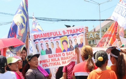 <p>Members of the Liga Independencia Filipina peace group chant "Do not vote for #ShamefulNine" during a rally in Mendiola, Manila on Wednesday (April 24, 2019). <em>(Photo by Christine Cudis)</em></p>