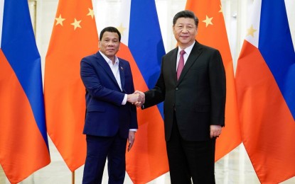 <p>President Rodrigo Roa Duterte and People's Republic of China President Xi Jinping pose for posterity prior to the start of the bilateral meeting at the Great Hall of the People in Beijing on April 25, 2019. (King Rodriguez/Presidential Photo)</p>