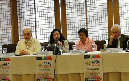 <p>World Health Organization Global Tuberculosis Program director Tereza Kasaeva (2nd from left) says while tuberculosis is an airborne disease, it can be contracted through smoking. <em>(Photo by Ma. Teresa Montemayor)</em></p>