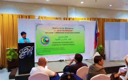 <p><strong>CORRECTING MISIMPRESSION.</strong> NCMF Bureau of Cultural Affairs head Laman Piang speaks before the distribution of textbooks that will help improve Islamic studies in Mindanao in Davao City on Thursday (April 25). <em><strong>(Photo courtesy of NCMF)</strong></em></p>