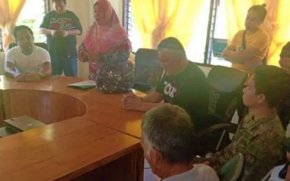 <p><strong>FEUD SETTLEMENT.</strong> Mayor Edna Benito of Balabagan, Lanao del Sur speaks before members of the warring families emphasizing the Army’s desire to attain peace in the locality. <em><strong>(Photo courtesy of 6th IB)</strong></em></p>