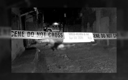 <p><strong>NEUTRALIZED.</strong> The lifeless body of drug suspect Renato Piano after an armed encounter with the police operatives in a buy bust operation in Barangay San Rafael V, City of San Jose Del Monte.  Aside from Piano, three other drug suspects were killed and eight others were nabbed in a simultaneous simultaneous operations conducted by the Bulacan police in two days. <em>(Photo by Manny Balbin) </em></p>