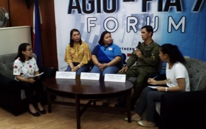<p><strong>AGIO-PIA FORUM.</strong> Department of Interior and Local Government-Central Visayas officers Deanna Alila (second from left) and Kym Albrando (center) grace the Association of Government Information Officers-Philippine Information Agency (AGIO-PIA) 7 forum together with Task Force Cebu commander Col. Noel Baluyan on Tuesday (April 30, 2019). DILG-7 has given more than PHP800,000 worth of financial assistance to rebel returnees in the region.(<em>Photo by Luel Galarpe</em>)</p>