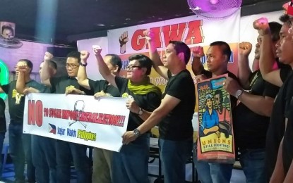 <p>Leaders and representatives from various labor groups in Negros Occidental launch the Sugar Watch Philippines during a Labor Day forum in Bacolod City on Wednesday. <em>(Photo by Erwin P. Nicavera)</em></p>