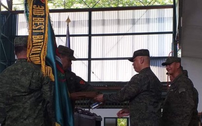 <p><strong>BEST BATTALION.</strong> Lt. Gen. Macairog Alberto (2<sup>nd</sup> from right), commanding general of  Philippine Army, and Maj. Gen. Dinoh Dolina (right), commander of  3<sup>rd</sup> Infantry Division, lead the awarding of the recognition as Best Battalion for 2019 to Lt. Col. Emelito Thaddeus Logan, commander of 79<sup>th</sup> Infantry Battalion, during the Division’s 45th Founding Anniversary celebration held at Camp Gen. Macario Peralta Jr. in Jamindan, Capiz on Wednesday (May 1, 2019). Last month, the Army unit's troops received Military Commendation Medals from the 303rd Infantry Brigade.<em>  (Photo courtesy of 79th Infantry Battalion, Philippine Army)</em></p>