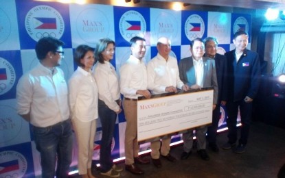 <p>Top officials from the Max's Group Inc. formally gives the Philippine Olympic Committee a PHP10.5 million investment pledge in a ceremony at the Max's Kabisera Restaurant in Taguig on Thursday (May 2, 2019). <em>(Photo by Ivan Stewart Saldajeno)</em></p>
