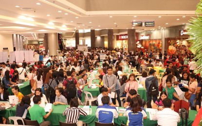 <p><strong>JOB APPLICANTS BY THE THOUSANDS.</strong> Thousands of jobseekers join the Labor Day job fair at the Robinsons Place-Jaro facilitated by the Department of Labor and Employment (DOLE) Western Visayas on Wednesday (May 1, 2019).  The region based on the January 2019 Labor Force Survey of the Philippine Statistics Authority was at 96.1 percent, an increase of one percent when compared with the 2017 survey. <em> (Photo by  DOLE 6)</em></p>