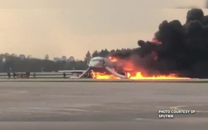 <p><strong>PLANE ON FIRE.</strong> Aeroflot SU 1492 crash-landed in Sheremetyevo Airport, bursting into flames on impact and killing at least 41 people on board, on Sunday (May 5, 2019). There was no Filipino casualty in the crash.<em> (Courtesy of Sputnik)</em></p>