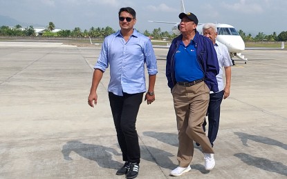 <p><strong>AIRPORT INSPECTION.</strong> Transporation Secretary Arthur Tugade (right) inspects the ongoing development of Ormoc Airport in northwestern part of Leyte Thursday morning (May 9, 2019). Joining the transportation chief are Ormoc City Mayor Richard Gomez (left) and Civil Aviation Authority of the Philippines Director General Jim Sydiongco (partly hidden). <em>(PNA photo by Sarwell Meniano)</em></p>