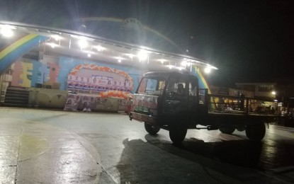 <p><strong>BLOCKED.</strong> |The group of Eastern Samar lone district congressional aspirant Christopher Sheen Gonzales cancelled a campaign rally after a big truck parked at the center of the town’s plaza in Guiuan, Eastern Samar Friday night (May 10, 2019). Gonzales' camp, in a statement, said it will not push through with the rally for the safety of its supporters. <em>(Photo by Lizbeth Ann A. Abella)</em></p>