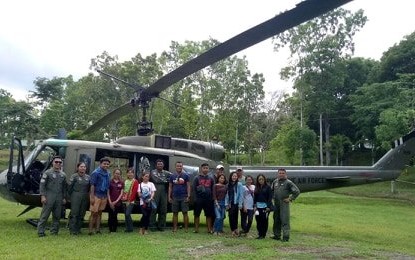 <p><strong>AIR SUPPORT.</strong> Personnel of the Philippine Air Force Tactical Operations Group 6 (PAF-TOG 6) and members of the Board of Election Inspectors (BEI) on Saturday (May 11, 2019) pose before boarding the helicopter that will take them to the three upland barangays of Tapaz, Capiz for their election assignment on May 13.  Barangay Hilwan, the farthest town from the Poblacion, can be reached after a 16 hour travel by foot or motorcycle ride for a two-and-a-half hour. <em>(Photo courtesy of PAF-TOG 6)</em></p>
<p> </p>