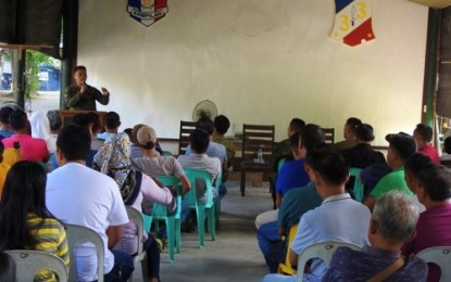 <p><strong>UNITY FOR POLLS.</strong> Lieutenant Colonel Elmer Boongaling, the commander of the Army's 33rd Infantry Battalion, speaks before barangay officials of six adjoining Maguindanao towns and two local government units in Sultan Kudarat as part of the Army’s aspiration for a peaceful and orderly balloting Monday. The military has sought the help of village officials, the Moro Islamic Liberation Front, and the Moro National Liberation Front in the two provinces on Saturday (May 11) to ensure honest, orderly and peaceful elections. (<em>Photo courtesy of 33rd IB)</em></p>