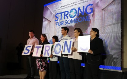<p><strong>EMPOWERMENT.</strong> Representatives from Roche, PCSO, DOH, support groups and vlogger, Wil Dasovich, during the launch of "Strong for Someone" campaign on May 10 at Marquis Events Place. <em>(PNA photo by Cristina Arayata)</em></p>
