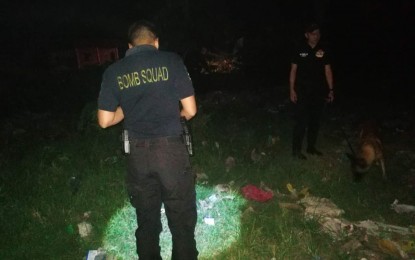 <p><strong>BLAST SITE.</strong> Police inspect the blast site at Barangay Rosary Heights 10 in Cotabato City on Sunday night (May 12, 2019). No one was reported hurt in the blast that occurred hours before the conduct of the mid-term polls. <em>(Contributed photo)</em></p>