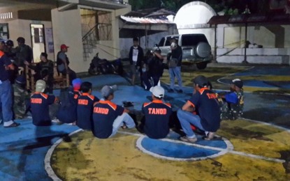 <p><strong>GUN BAN VIOLATORS</strong>. Twelve village watchmen at Jaboyo village, Lambunao town, Iloilo are caught carrying firearms and staging checkpoint in front of the Joboyo's village hall a night before the Monday elections (May 12, 2019). The Commission on Elections gun ban violators are currently held at Lambunao Municipal Police Station, Maj. Rene Obregon, Lambunao police chief said.<em> (Photo courtesy of Iloilo Police Provincial Office</em></p>