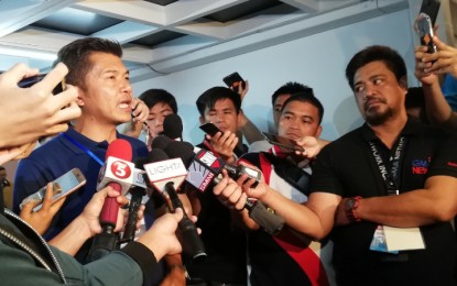 <p><strong>POLL FRAUD?</strong> Senatorial bet Glenn Chong, who claims losing votes in six areeas during the mid-term polls. speaks to reporters after his closed-door meeting with Comelec officials at the PICC in Pasay City. <em>(PNA photo by Joyce Ann L. Rocamora)</em></p>
