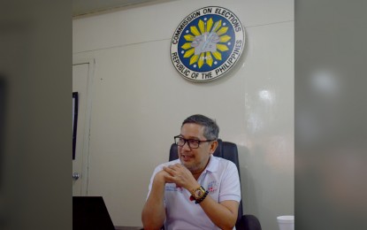 <p><strong>A BIT LATE. </strong> Commission on Elections Eastern Visayas Regional Director Rafael Olaño answers question on delayed voting in Northern Samar at his office on Monday (May 13, 2019).   Voting had been delayed in some villages in Northern Samar due to peace and order concern and corrupted SD cards. <em>(PNA photo by Sarwell Q. Meniano</em>)</p>