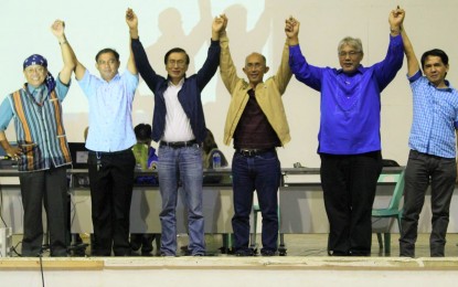 <p><strong>WINNERS ALL.</strong> Retired police director Benjamin Magalong (4<sup>th</sup> from left) was proclaimed as winning mayor in Baguio City before midnight on May 13. Also proclaimed were re-electionist Congressman Mark Go (3<sup>rd</sup> from left) and winning vice mayor Faustino Olowan (5<sup>th</sup> from left). <em>(Photo by Pamela Mariz Geminiano)</em></p>