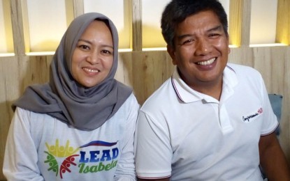 <p><strong>POLITICAL COUPLE.</strong> Former Governor Mujiv Hataman of the defunct Autonomous Region in Muslim Mindanao and his wife, Sitti Djalia, lead in the congressional race for the lone district of Basilan and Isabela City mayoralty race, respectively, in the 2019 mid-term polls. Mujib vowed to continue his advocacy against political dynasty once he assumes post as solon.<em> (Photo by Teofilo P. Garcia Jr.)</em></p>