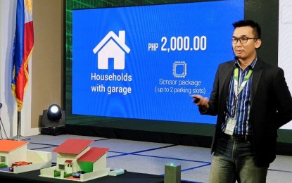 <p><strong>WINNING APP.</strong> Noel Daniel Seldura of University of San Jose - Recoletos presents the features of their #FutureREady 5G Internet of Things (IoT) solution called "Carspace" at the Smart SWEEP15 Grand Finals held at Discovery Primea in Makati City on May 10. The USJR contingent brought home the top prize of PHP300,000. <em>(Photo courtesy of Domiguez Marketing Communications, Inc)</em></p>
