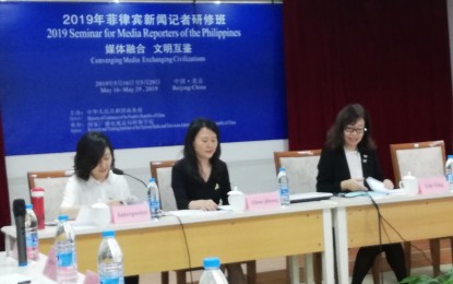 <p>Zhou Jihong (center), deputy director-general National Radio and Television Administration's (NRTA)International Cooperation Department; and Liu Ying (right), vice president of Research and Training Institute of NRTA) during the opening of the Seminar for Media Reporters of the Philippines in Beijing on Friday (May 17, 2019). <em>(PNA photo by Dennis Carcamo)</em></p>