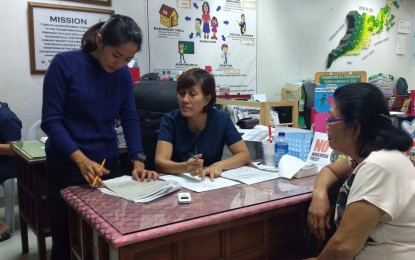 <p><strong>CASH DISBURSEMENT.</strong> Employees at the Provincial Social Welfare and Development Office(PSWDO) check on the documents of the client seeking medical assistance on Tuesday (May 21, 2019). The PSWDO can now disburse Assistance to Individuals in Crisis Situation after Commission on Elections Resolution 10511 barred the disbursement from March 29 to May 12.<em> (PNA Photo by Gail Momblan)</em></p>
<p> </p>