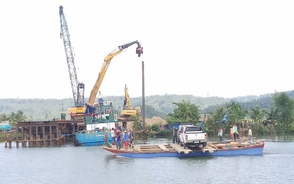 <p><strong>CONSTRUCTION PROJECTS.</strong> The ongoing contruction of Simora Bridge that links Laoang town center to the mainland is one of the projects monitored by the church-led Samar Island Partnership for Peace and Development. Catholic Bishop Crispin Varquez of the Diocese of Borongan said the Eastern Samar development projects monitoring team will closely check on the civil works despite security threats. <em>(Photo from FB page of Borongan Diocesan Social Action Center)  </em></p>