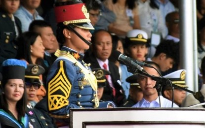 <p><strong>VALEDICTORY ADDRESS.</strong> Philippine Military Academy Mabalasik Class 2019 top graduate, Dionne Mae Umalla, delivers her valedictory address during the graduation ceremony at the Fort Del Pilar, Baguio City on Sunday (May 26, 2019). President Rodrigo Duterte conferred the ranks of Second Lieutenant and Ensign to 261 cadets who completed their four-year education at the country’s premier military academy. <em>(Photo by Redjie Melvic Cawis/ PIA-CAR)</em></p>