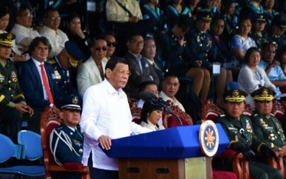 <p><strong>PMA GRADUATION. </strong>President Rodrigo Duterte delivers his keynote speech during the commencement exercises of PMA cadet graduates at the Fort General Gregorio Del Pilar, Baguio City on Sunday (May 26, 2019). <em>(Redjie Melvic Cawis/ PIA-CAR)</em></p>