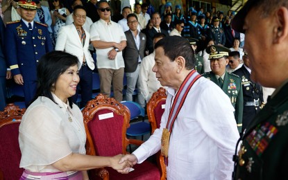 <p><strong>ROBREDO IS ICAD CO-CHAIR</strong>.  President Rodrigo Duterte greets Vice President Maria Leonor Robredo on the sidelines of the commencement exercises of the Philippine Military Academy (PMA) ‘Mabalasik’ Class of 2019 at Fort General Gregorio del Pilar in Baguio City on May 26, 2019. Duterte has named Robredo as co-chair of the Inter-Agency Committee on Anti-Illegal Drugs (ICAD). <em>(Presidential photo by King Rodriguez)</em></p>