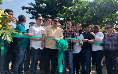 <p><strong>NLEX-SCTEX LINK. </strong>Angeles City Mayor Edgardo Pamintuan (center), together with other officials, leads the ribbon-cutting ceremony for the formal start of construction of the Abacan Highway (NLEX-SCTEX Connecting Road) on Wednesday (May 29, 2019). The road network is seen to decongest the traffic situation in the city. (<em>Photo courtesy of the Angeles City government</em>)</p>
<p> </p>
<p> </p>