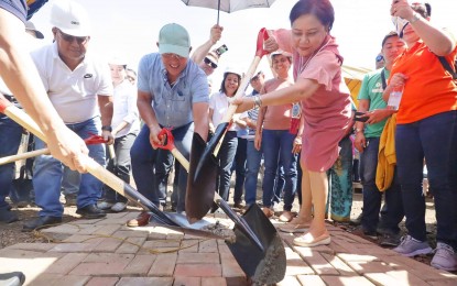<p><strong>SOCIALIZED HOUSING.</strong> Sen. Cynthia Villar (center right) leads the ground breaking of a socialized housing project in Cagayan de Oro City Tuesday. She is joined by city officials and community leaders. <em>(Photo by Ercel Maandig)</em></p>
