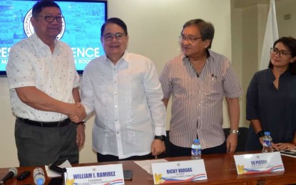 <p><strong>NEW CHEF DE MISSION. </strong> Philippine Sports Commission chairman William Ramirez (left) and Philippine Olympic Committee  president Ricky Vargas shake hands during a press conference at the PSC building on Wednesday (May 29, 2019).  Ramirez announced his decision to accept the post of chef de mission of Team Philippines in the 30th SEA Games. Also in photo are POC communication director Ed Picson and POC deputy secretary general and sepak takraw president Karen Caballero (right). <em>(Contributed photo)</em></p>