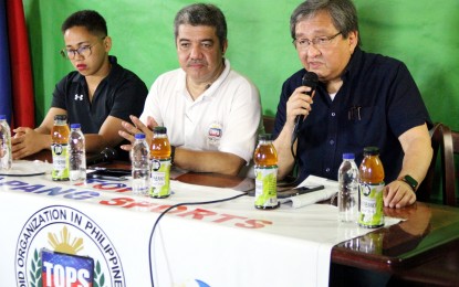 <p><strong>CALL FOR UNITY: </strong> Philippine Olympic Committee (POC) communications director Ed Picson (right) discusses the recent committee revamp during the 24th TOPS Usapang Sports at the National Press Club in Intramuros, Manila on Thursday (May 30, 2019).  Picson said POC president Ricky Vargas appealed for unity as he reached out to his fellow leaders, including former POC chief Jose ‘Peping’ Cojuangco who was removed as chairman of the committee on constitution and by-laws. Also in photo is 2016 Olympic Games weightlifter silver medalist Hidilyn Diaz (left) and TOPS president Ed Andaya. <em>(PNA photo by Jess M. Escaros Jr.)</em></p>