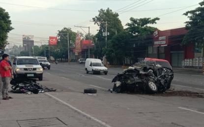 <p><strong>ROAD MISHAP.</strong> A totally damaged Mazda Sedan car remains in the middle of the Quimpo Boulevard hours after colliding with a passenger bus  Friday morning, resulting in the death of two persons and the injury of two others. <em><strong>(Photo courtesy of City Police Office)</strong></em></p>