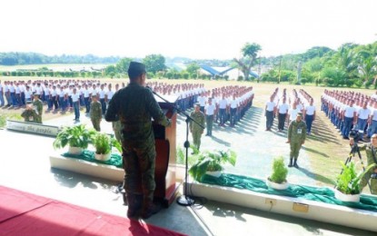 <p><strong>READY FOR TRAINING.</strong> Maj. Gen. Cirilito Sobejana (back to camera), commander of the Army’s 6th Infantry Division, speaks before candidate soldiers during sendoff ceremonies at Camp Siongco in Datu Odin Sinsuat, Maguindanao, Sunday. A total of 345 trainees are up for a 14-week military training to become future soldiers of the Philippine Army. <em><strong>(Photo courtesy of 6ID)</strong></em></p>