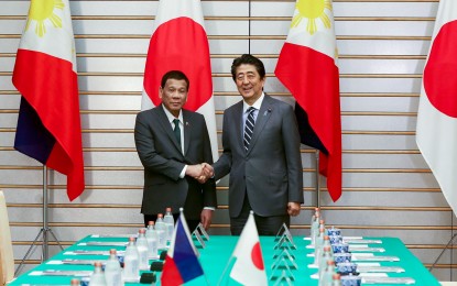 <p><strong>INTENSIFIED TIES.</strong> President Rodrigo Roa Duterte and Japanese Prime Minister Shinzo Abe reaffirm friendship and commitment with a more intensified development partnership during the summit at the Prime Minister's Office in Tokyo, Japan on May 31, 2019. During his working visit, Duterte witnessed the signing of 26 business agreements with Japan that have estimated investment value of around PHP288 billion. <em>(Presidential Photo)</em></p>
