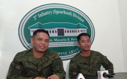 <p><strong>PRO-ROTC.</strong> Capt. Cenon Pancito (L), new chief of the Division Public Affairs Office (DPAO) of the 3rd Infantry Battalion (ID), expresses his support for making the Reserve Officers' Training Corps (ROTC) program mandatory for senior high school students during a press conference at Camp Delgado on Wednesday (June 5, 2019). Pacito will replace former DPAO chief Capt. Eduardo Precioso (R), who will be assigned at 3ID's Civil Military Operations. <em>(PNA Photo by Gail Momblan)</em></p>
