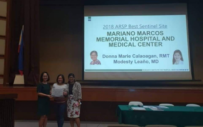 <p>Dr. Uzziel Ginette Bascao, Chief Resident of the MMMHMC's Department of Pathology and Laboratories, and Donna Marie Calaoagan, Medical Technologist and the Bacteriology Section Supervisor, receive the Most Outstanding Sentinel Site for MMMHMC and Best Hospital Report for 2018 for its successful implementation of the Antimicrobial Resistance Surveillance Program (ARSP) of the Department of Health. <em>(Photo by Donna Marie Calaoagan)</em></p>