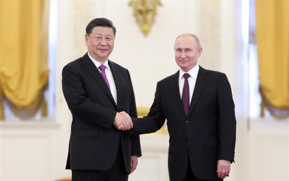 <p><strong>UPGRADE TIES</strong>. Chinese President Xi Jinping (L) shakes hands with his Russian counterpart Vladimir Putin while posing for photos ahead of their talks in Moscow, Russia, June 5, 2019. Xi Jinping held talks with Vladimir Putin at the Kremlin in Moscow on Wednesday.<em> (Xinhua/Ding Haitao)</em></p>