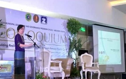 <p><strong>GRADUATION SPEECH</strong>. Carina Flores, municipal mayor of Oton, Iloilo, shares the health gains of Oton town through the Municipal Leadership and Health Governance Program (MLGP) Colloquium graduation in a hotel in Iloilo City on Wednesday (June 5, 2019). Oton town is among the municipalities in the region that has secured responsive health systems through the MLGP Colloquium. <em>(Photo courtesy of Hope Torrechante)</em></p>