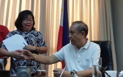 <p><strong>ACTION VS. DENGUE.</strong> Iloilo Governor Arthur Defensor, Sr. (R) on Thursday (June 6, 2019) discusses with Dr. Patricia Grace Trabado, Provincial Health Office (PHO) chief, about the actions to be taken by the government to prevent the further increase of dengue cases in the province. Defensor has scheduled a meeting with all municipal mayors and municipal health officers in the Iloilo on June 10 to set a "high sense of urgency" on 12 dengue deaths and 2, 441 cases from January 1 to June 1 this year. <em>(PNA Photo by Gail Momblan)</em></p>