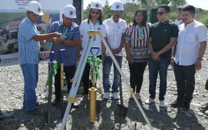 <p><strong>LIMAHONG CHANNEL TOURISM CENTER</strong>. Pangasinan's Second District Representative and Lingayen Mayor-elect Leopoldo Bataoil (far left) lowers a time capsule on Thursday, June 6, 2019, at the grounds where the Limahong Tourist Center/Multi-Purpose Building will be constructed. Also in photo are Bugallon Mayor and 2nd District Representative-elect Jumel Espino, District Engineer Edita Manuel (Pangasinan 2nd District Engineering Office) and newly elected officials of Lingayen. The historical Limahong Channel was identifed as a tourist spot by virtue House Bill 6682 principally authored by Rep. Bataoil. <em>(Photo by Liwayway Yparraguirre)</em></p>